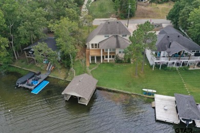 Welcome to stunning lakefront retreat in Hideaway, TX! This on Hide-A-Way Lake Golf Course in Texas - for sale on GolfHomes.com, golf home, golf lot