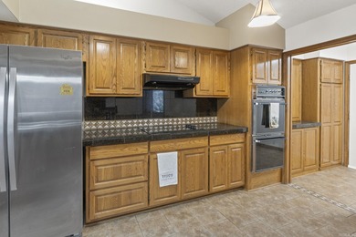 New Listing! Discover serene living with a back yard oasis with on Ponce De Leon Golf Course in Arkansas - for sale on GolfHomes.com, golf home, golf lot