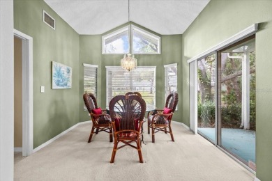 BEAUTIFUL SECLUDED WOODRIDGE GREEN VILLA in prestigious East on East Lake Woodlands Country Club in Florida - for sale on GolfHomes.com, golf home, golf lot