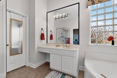 Experience refined living in this elegant 5-bedroom, 4-bath on Heritage Lakes - Par 3 - 9 Hole Course in Texas - for sale on GolfHomes.com, golf home, golf lot