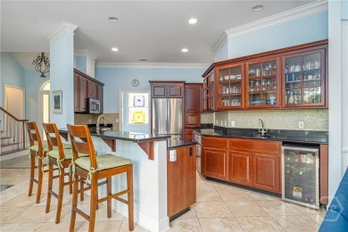 Located only a minute from the Oakridge gate, this custom stucco on The Landings Club - Marshwood in Georgia - for sale on GolfHomes.com, golf home, golf lot