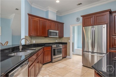 Located only a minute from the Oakridge gate, this custom stucco on The Landings Club - Marshwood in Georgia - for sale on GolfHomes.com, golf home, golf lot