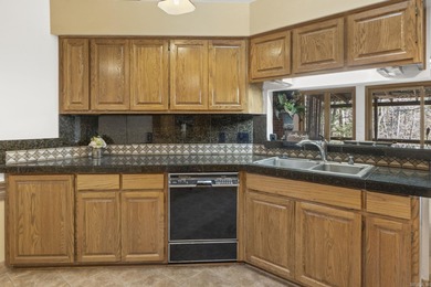 New Listing! Discover serene living with a back yard oasis with on Ponce De Leon Golf Course in Arkansas - for sale on GolfHomes.com, golf home, golf lot