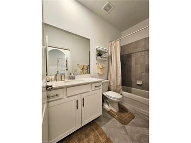 Enjoy elevated resort-style living in this beautiful Birkdale on Panther Run Golf Club in Florida - for sale on GolfHomes.com, golf home, golf lot