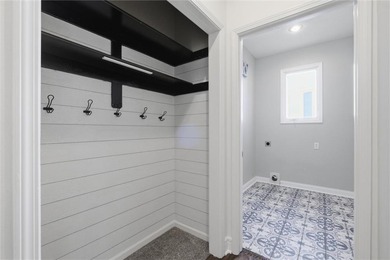 Welcome to this exceptional 1.5-story home in Lionsgate by the on Nicklaus Golf Club At LionsGate in Kansas - for sale on GolfHomes.com, golf home, golf lot