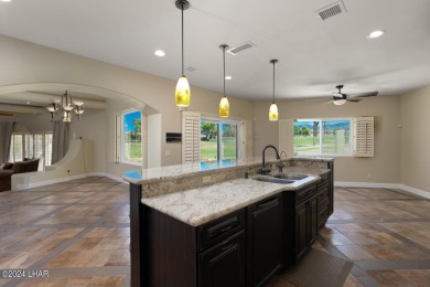 Beautifully Remodeled  Residential Estate home is directly on on London Bridge Golf Course in Arizona - for sale on GolfHomes.com, golf home, golf lot