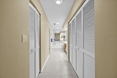 BEAUTIFUL SECLUDED WOODRIDGE GREEN VILLA in prestigious East on East Lake Woodlands Country Club in Florida - for sale on GolfHomes.com, golf home, golf lot