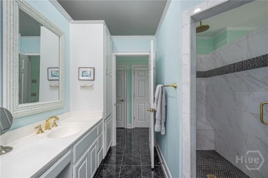 Located only a minute from the Oakridge gate, this custom stucco on The Landings Club - Marshwood in Georgia - for sale on GolfHomes.com, golf home, golf lot