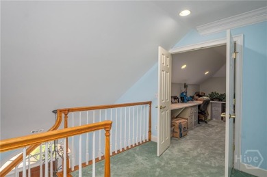 Located only a minute from the Oakridge gate, this custom stucco on The Landings Club - Marshwood in Georgia - for sale on GolfHomes.com, golf home, golf lot