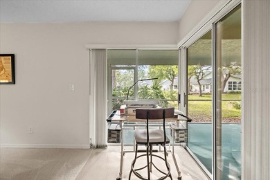 BEAUTIFUL SECLUDED WOODRIDGE GREEN VILLA in prestigious East on East Lake Woodlands Country Club in Florida - for sale on GolfHomes.com, golf home, golf lot