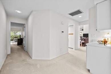BEAUTIFUL SECLUDED WOODRIDGE GREEN VILLA in prestigious East on East Lake Woodlands Country Club in Florida - for sale on GolfHomes.com, golf home, golf lot