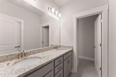 Discover luxury living in this barely lived-in gem nestled in on Traditions of Braselton Golf Club in Georgia - for sale on GolfHomes.com, golf home, golf lot