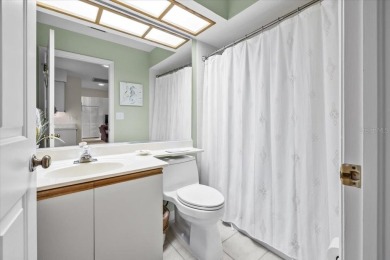 BEAUTIFUL SECLUDED WOODRIDGE GREEN VILLA in prestigious East on East Lake Woodlands Country Club in Florida - for sale on GolfHomes.com, golf home, golf lot