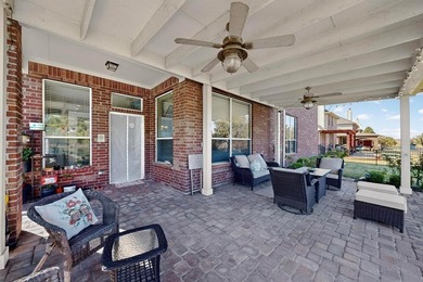 Experience refined living in this elegant 5-bedroom, 4-bath on Heritage Lakes - Par 3 - 9 Hole Course in Texas - for sale on GolfHomes.com, golf home, golf lot