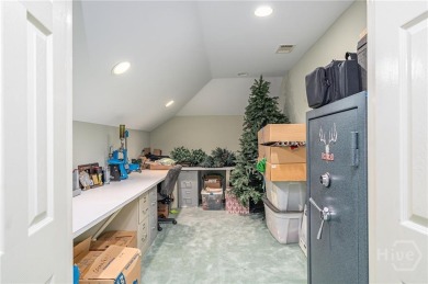 Located only a minute from the Oakridge gate, this custom stucco on The Landings Club - Marshwood in Georgia - for sale on GolfHomes.com, golf home, golf lot