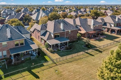 Experience refined living in this elegant 5-bedroom, 4-bath on Heritage Lakes - Par 3 - 9 Hole Course in Texas - for sale on GolfHomes.com, golf home, golf lot