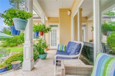 Located only a minute from the Oakridge gate, this custom stucco on The Landings Club - Marshwood in Georgia - for sale on GolfHomes.com, golf home, golf lot