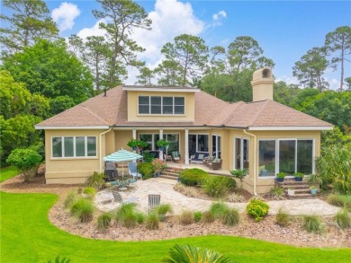 Located only a minute from the Oakridge gate, this custom stucco on The Landings Club - Marshwood in Georgia - for sale on GolfHomes.com, golf home, golf lot