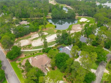 Located only a minute from the Oakridge gate, this custom stucco on The Landings Club - Marshwood in Georgia - for sale on GolfHomes.com, golf home, golf lot