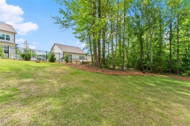Discover luxury living in this barely lived-in gem nestled in on Traditions of Braselton Golf Club in Georgia - for sale on GolfHomes.com, golf home, golf lot
