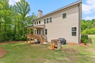 Discover luxury living in this barely lived-in gem nestled in on Traditions of Braselton Golf Club in Georgia - for sale on GolfHomes.com, golf home, golf lot