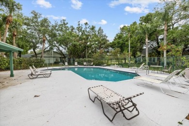 BEAUTIFUL SECLUDED WOODRIDGE GREEN VILLA in prestigious East on East Lake Woodlands Country Club in Florida - for sale on GolfHomes.com, golf home, golf lot