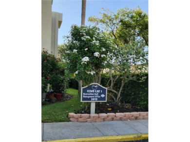 This top-floor, corner condo in the highly desired Village 4 of on Cove Cay Country Club in Florida - for sale on GolfHomes.com, golf home, golf lot