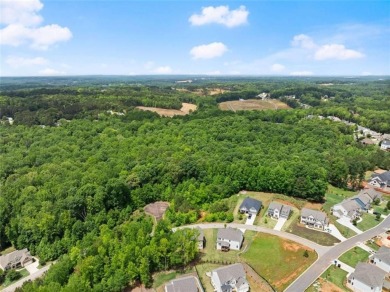 Motivated sellers are relocating for a new job, creating your on Traditions of Braselton Golf Club in Georgia - for sale on GolfHomes.com, golf home, golf lot