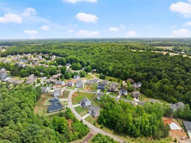 Motivated sellers are relocating for a new job, creating your on Traditions of Braselton Golf Club in Georgia - for sale on GolfHomes.com, golf home, golf lot