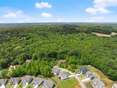 Motivated sellers are relocating for a new job, creating your on Traditions of Braselton Golf Club in Georgia - for sale on GolfHomes.com, golf home, golf lot