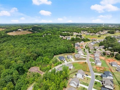 Motivated sellers are relocating for a new job, creating your on Traditions of Braselton Golf Club in Georgia - for sale on GolfHomes.com, golf home, golf lot