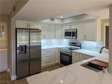 Discover the newest first-floor renovation in the sought-after on Hideaway Country Club in Florida - for sale on GolfHomes.com, golf home, golf lot