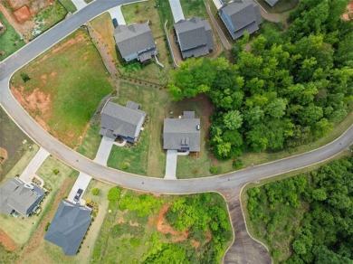 Motivated sellers are relocating for a new job, creating your on Traditions of Braselton Golf Club in Georgia - for sale on GolfHomes.com, golf home, golf lot