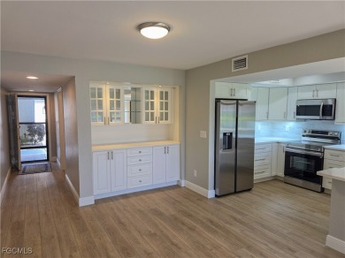 Discover the newest first-floor renovation in the sought-after on Hideaway Country Club in Florida - for sale on GolfHomes.com, golf home, golf lot