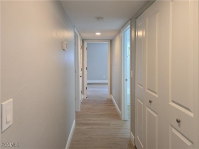 Discover the newest first-floor renovation in the sought-after on Hideaway Country Club in Florida - for sale on GolfHomes.com, golf home, golf lot