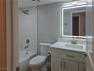 Discover the newest first-floor renovation in the sought-after on Hideaway Country Club in Florida - for sale on GolfHomes.com, golf home, golf lot