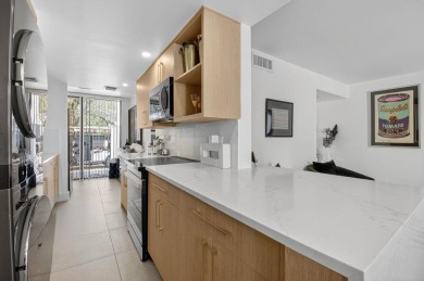 Welcome to an exquisite condo living in Boca West Country Club on Boca West Golf and Country Club in Florida - for sale on GolfHomes.com, golf home, golf lot