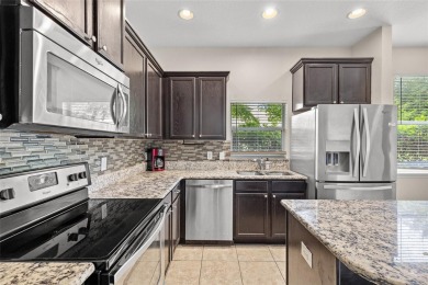 Under contract-accepting backup offers. Move-In Ready Beauty on Southridge Golf Course in Florida - for sale on GolfHomes.com, golf home, golf lot