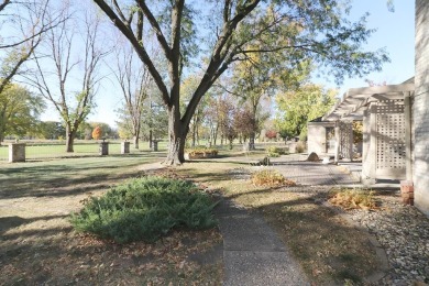 Elegant Brick Ranch Home situated on the Number Six Fairway of on Spencer Golf and Country Club in Iowa - for sale on GolfHomes.com, golf home, golf lot