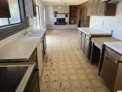 Here's an investment opportunity that could really turn out well on Silver City Golf Course in New Mexico - for sale on GolfHomes.com, golf home, golf lot