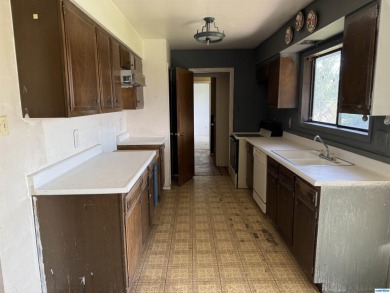 Here's an investment opportunity that could really turn out well on Silver City Golf Course in New Mexico - for sale on GolfHomes.com, golf home, golf lot