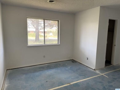 Here's an investment opportunity that could really turn out well on Silver City Golf Course in New Mexico - for sale on GolfHomes.com, golf home, golf lot