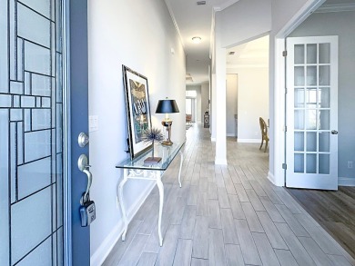 This impressive three bedroom, three bath Riverside home built on Amelia National Golf and Country Club in Florida - for sale on GolfHomes.com, golf home, golf lot