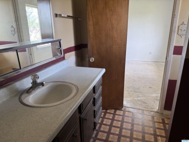 Here's an investment opportunity that could really turn out well on Silver City Golf Course in New Mexico - for sale on GolfHomes.com, golf home, golf lot