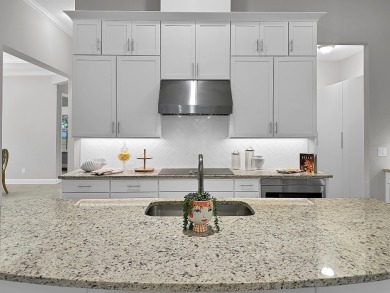 This impressive three bedroom, three bath Riverside home built on Amelia National Golf and Country Club in Florida - for sale on GolfHomes.com, golf home, golf lot