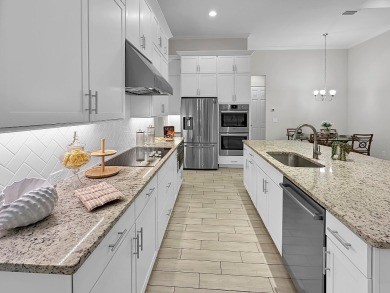 This impressive three bedroom, three bath Riverside home built on Amelia National Golf and Country Club in Florida - for sale on GolfHomes.com, golf home, golf lot
