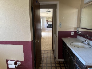 Here's an investment opportunity that could really turn out well on Silver City Golf Course in New Mexico - for sale on GolfHomes.com, golf home, golf lot