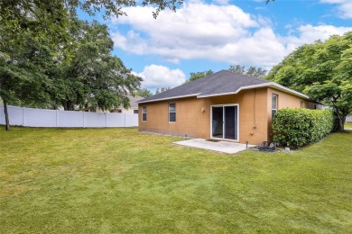 Under contract-accepting backup offers. Move-In Ready Beauty on Southridge Golf Course in Florida - for sale on GolfHomes.com, golf home, golf lot