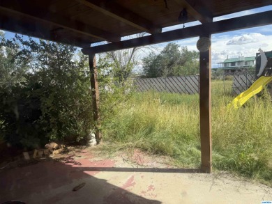 Here's an investment opportunity that could really turn out well on Silver City Golf Course in New Mexico - for sale on GolfHomes.com, golf home, golf lot