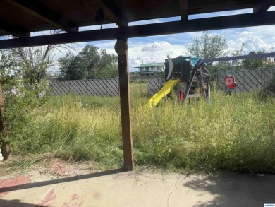 Here's an investment opportunity that could really turn out well on Silver City Golf Course in New Mexico - for sale on GolfHomes.com, golf home, golf lot